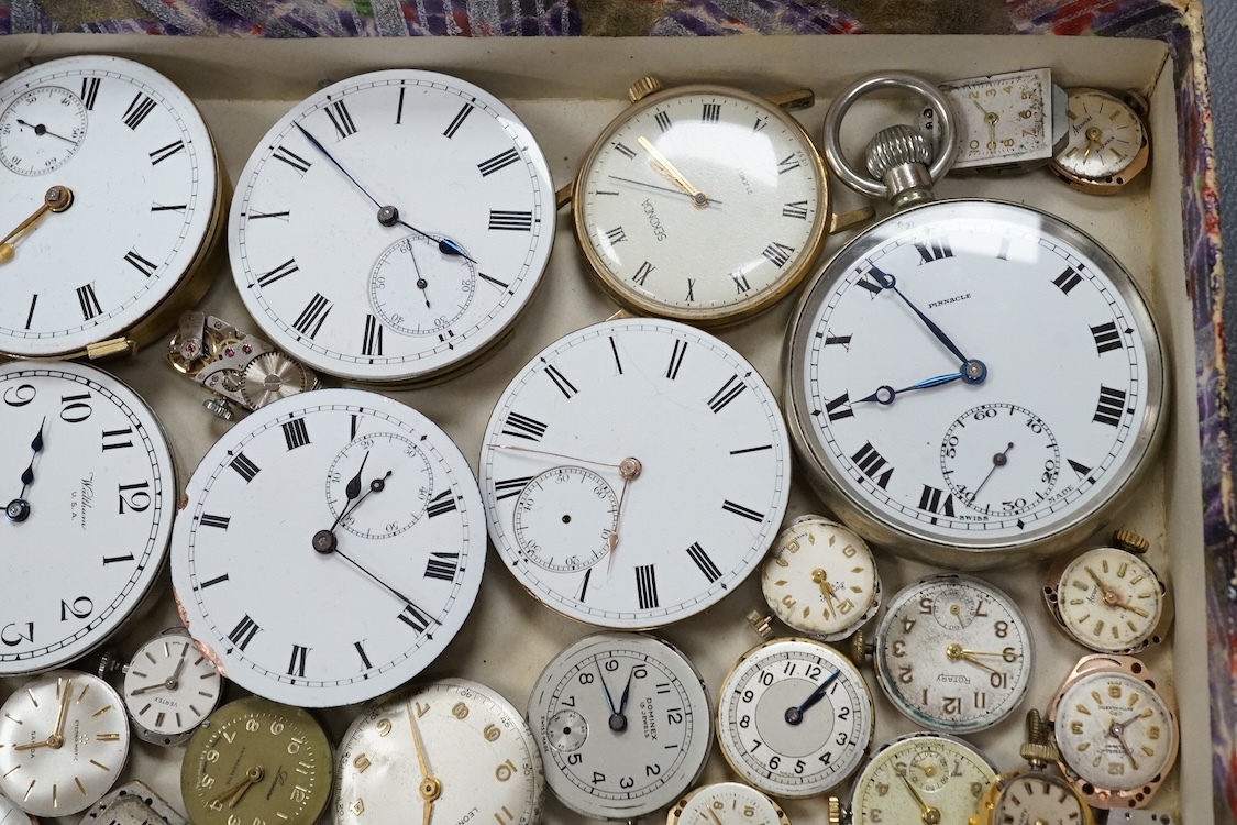 A quantity of assorted wrist and pocket watch movements, including Omega and Omega automatic, together with a pocket watch and a 935 white metal fob watch.